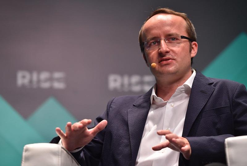 Kris Marszalek speaking at a conference in 2018