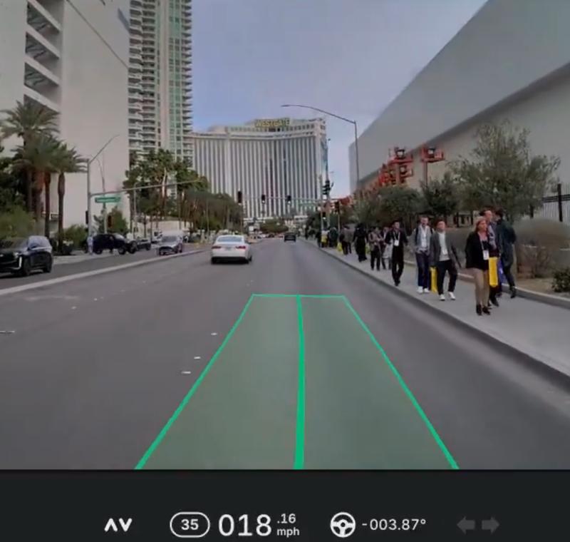Wayve self-driving vehicle using WFMs
